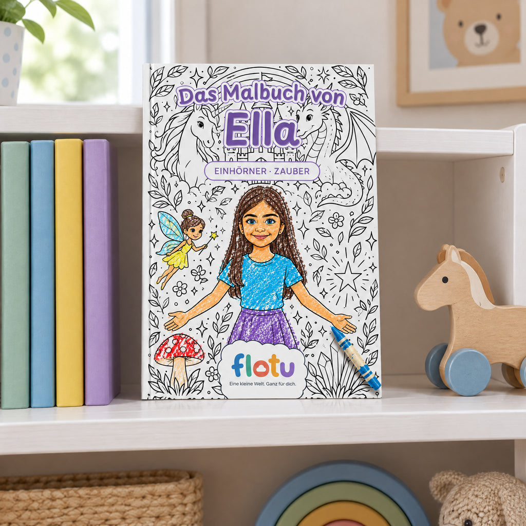 Das gedruckte Malbuch „Einhorn & Zauberwelt“ mit dem Namen Ella auf dem Cover