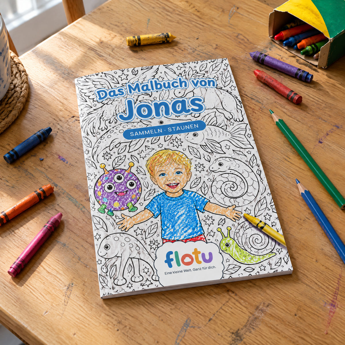 Das gedruckte Malbuch „Fabelwesen-Sammlung“ mit dem Namen Jonas auf dem Cover
