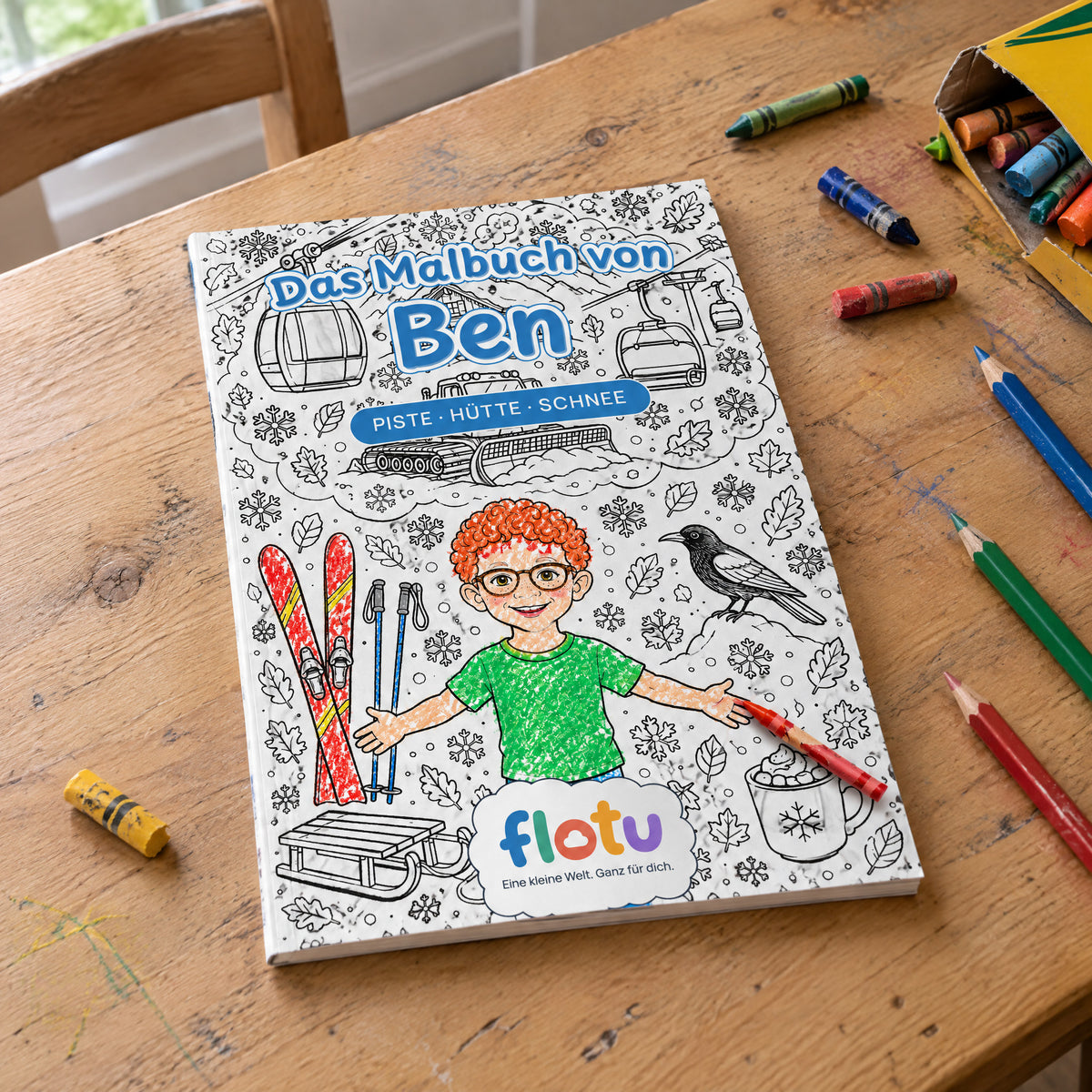 Das gedruckte Malbuch „Skiurlaub“ mit dem Namen Ben auf dem Cover